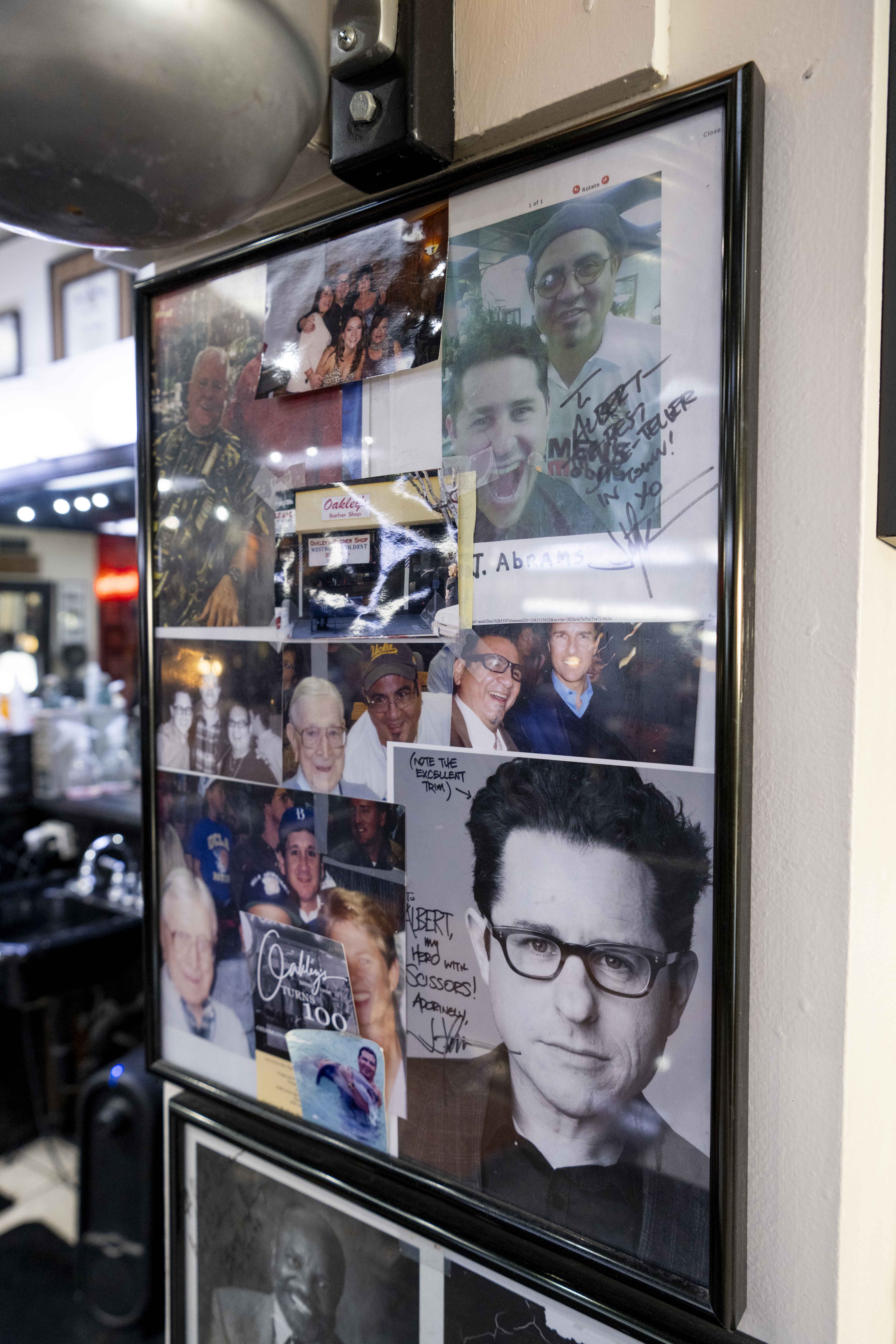 Pictures on the wall of Oakley’s Barber Shop.